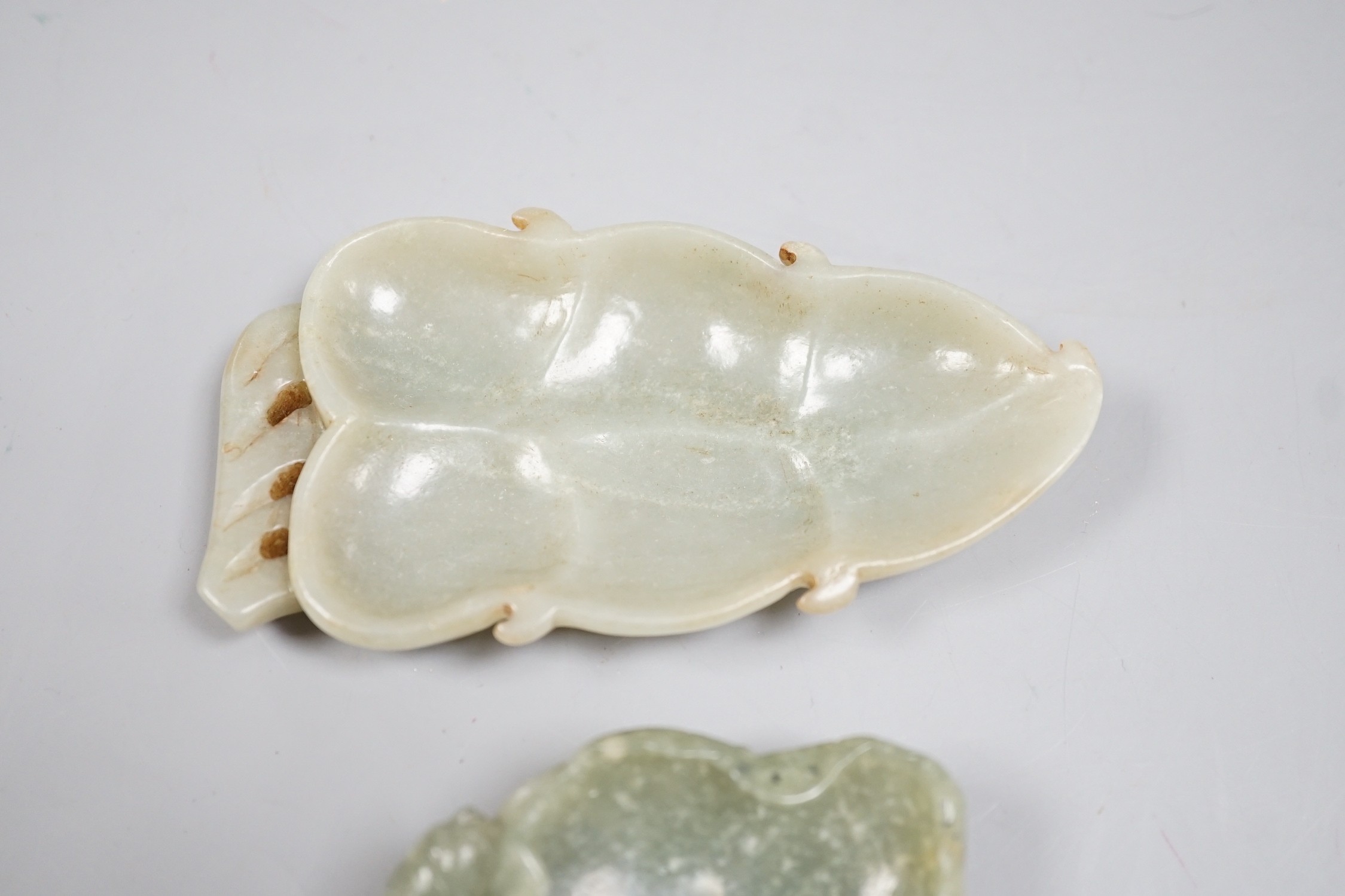 Two Chinese carved jade brushwashers, largest 11cm